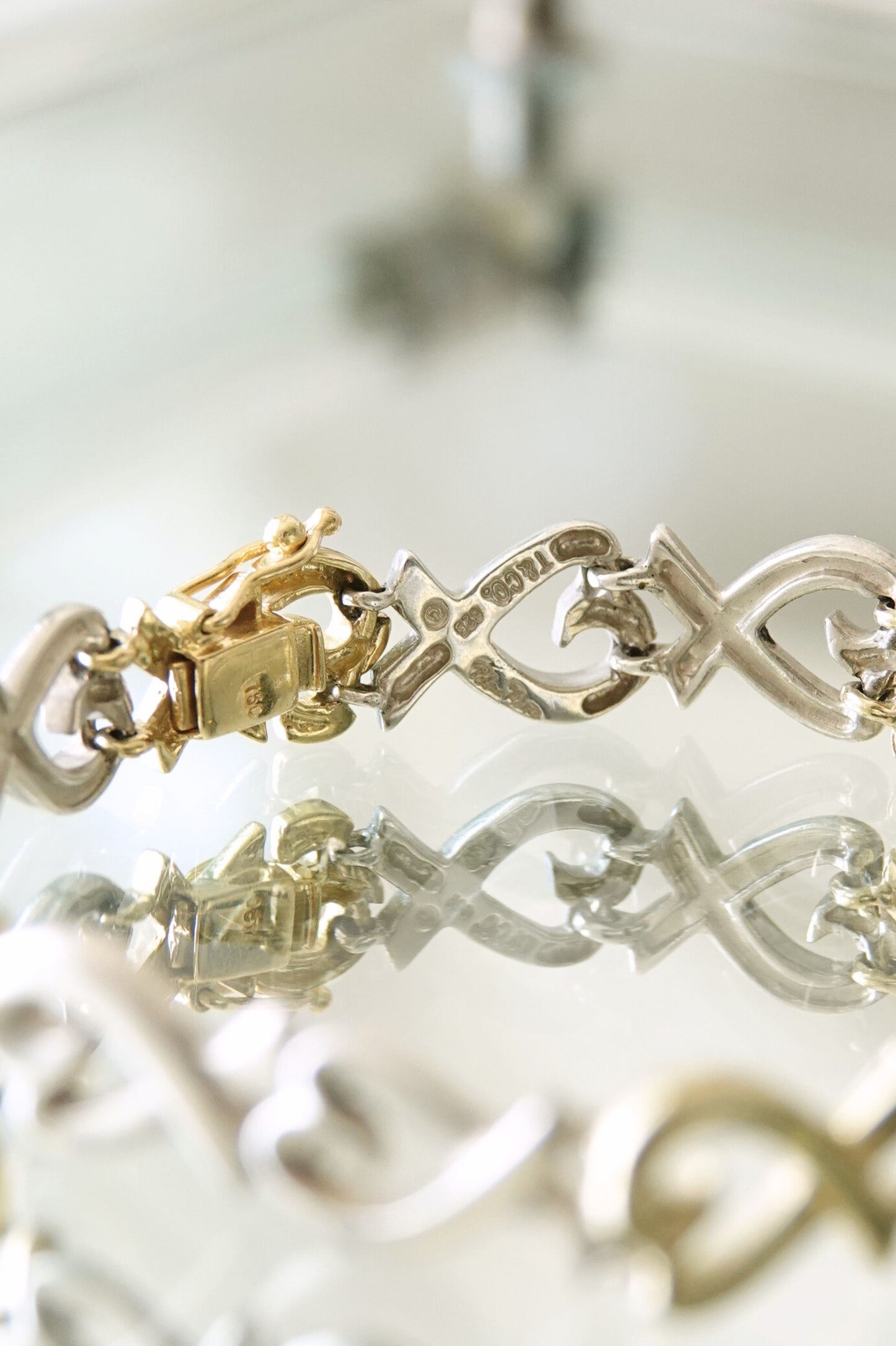Paloma Picasso for Tiffany & Co. Loving Heart link bracelet: close-up of clasp mechanism showing secure box clasp in sterling silver with safety lock