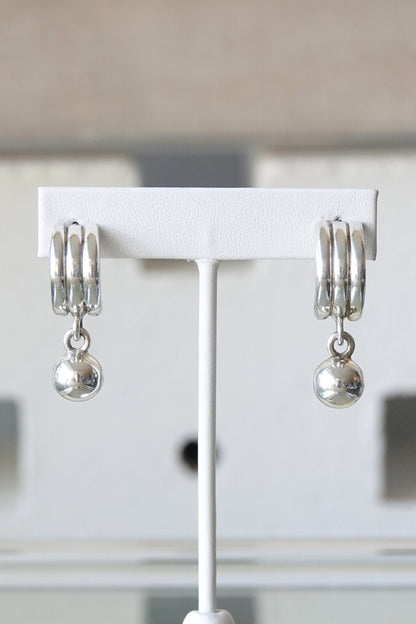 925 Mexico silver earrings — pair on glass reflective surface