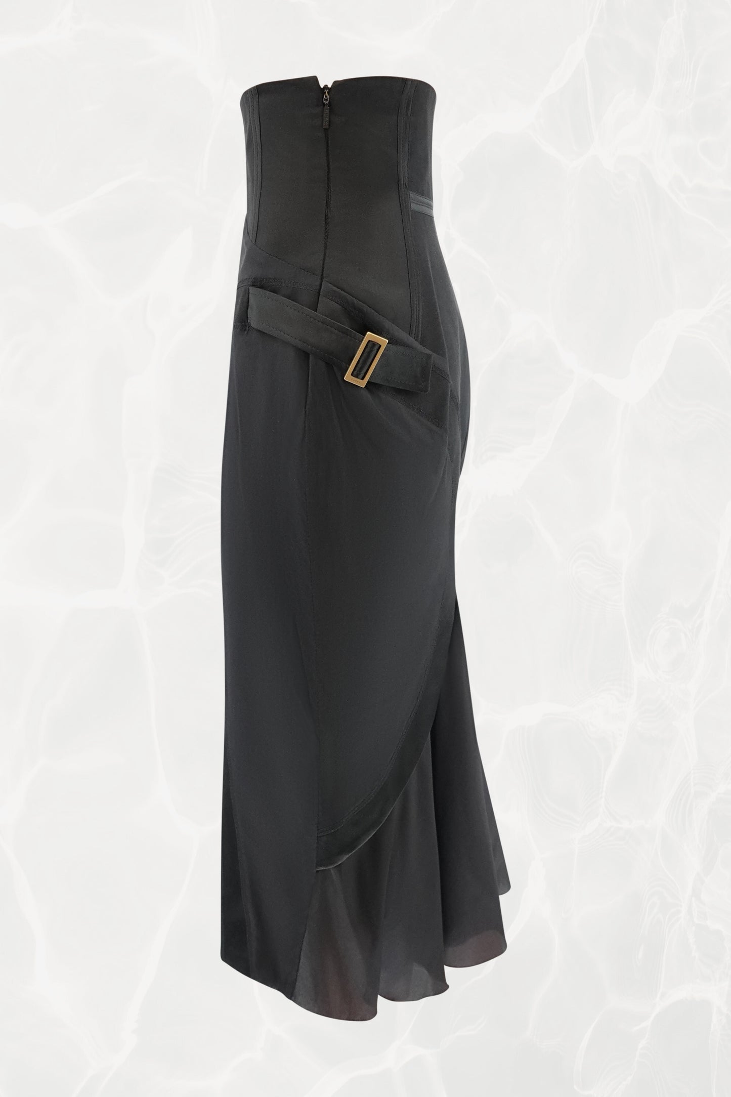 Tom Ford for Gucci FW03 black silk skirt side view: gold-tone square buckle hardware on side strap, structured corset high waist with back zipper, bias-cut flared hem, Fall 2003