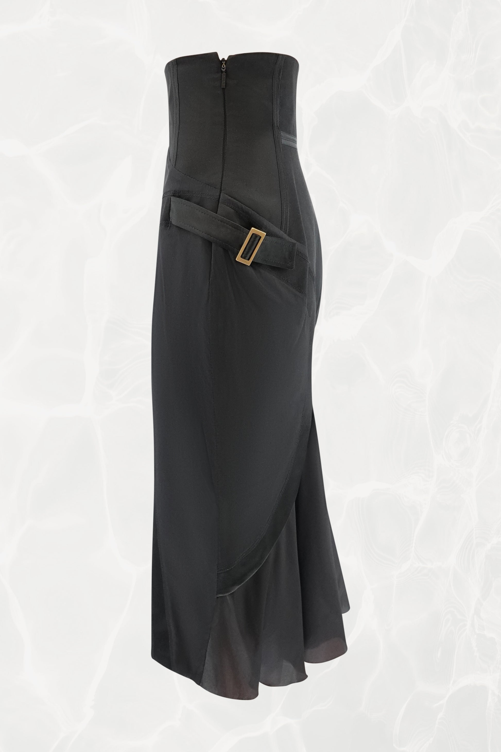 Tom Ford for Gucci FW03 black silk skirt side view: gold-tone square buckle hardware on side strap, structured corset high waist with back zipper, bias-cut flared hem, Fall 2003