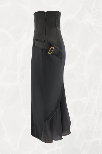 Tom Ford for Gucci FW03 black silk skirt side view: gold-tone square buckle hardware on side strap, structured corset high waist with back zipper, bias-cut flared hem, Fall 2003