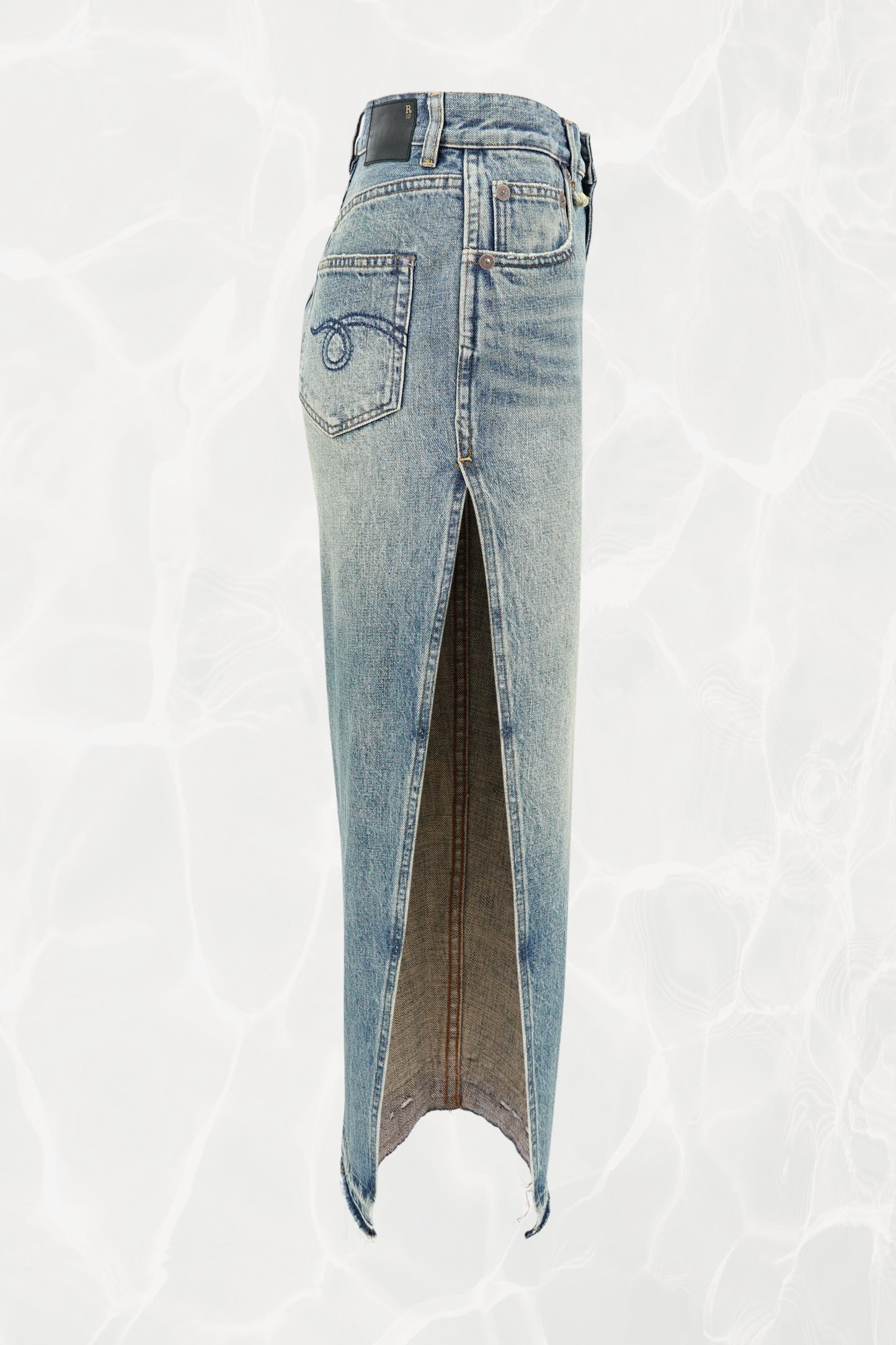 R13 pencil skirt, side profile showing high-waist silhouette — Disco Palma