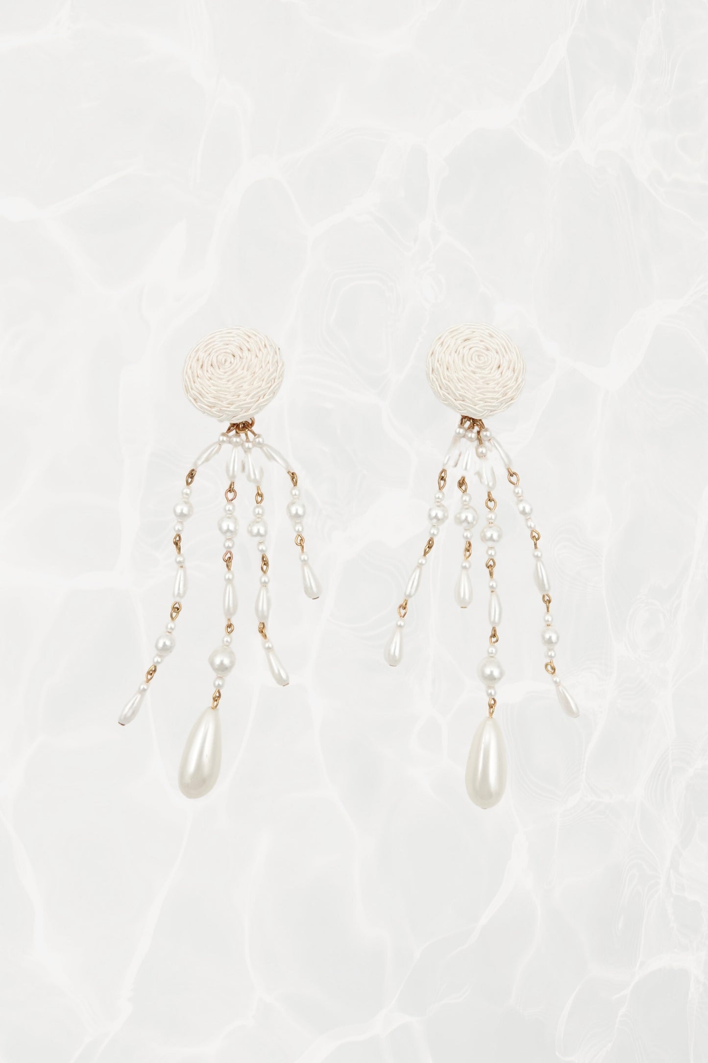 Vintage satin cord dome and faux pearl shoulder duster clip earrings, pair on textured background — Disco Palma