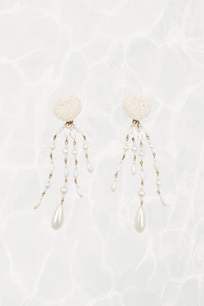 Vintage satin cord dome and faux pearl shoulder duster clip earrings, pair on textured background — Disco Palma