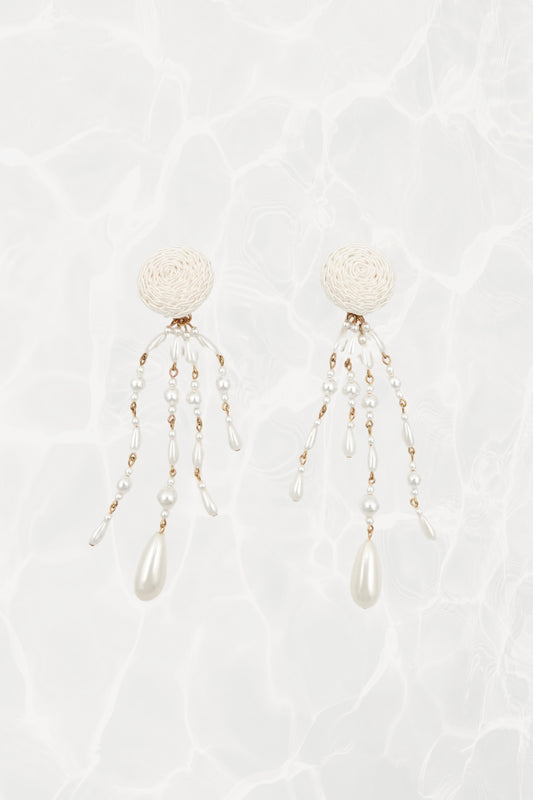 Vintage satin cord dome and faux pearl shoulder duster clip earrings, pair on textured background — Disco Palma