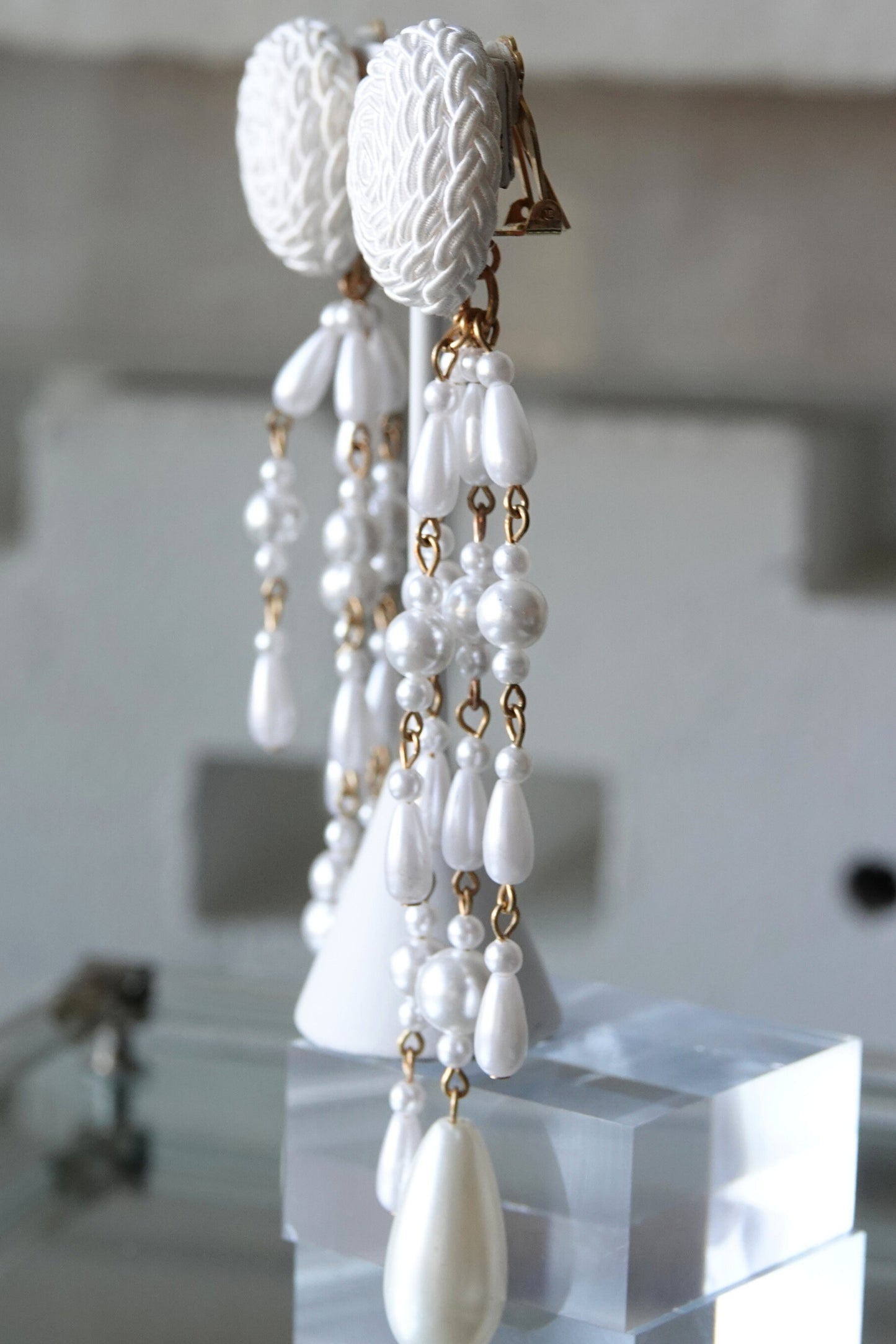Vintage faux pearl and satin cord clip earrings, styled detail — Disco Palma
