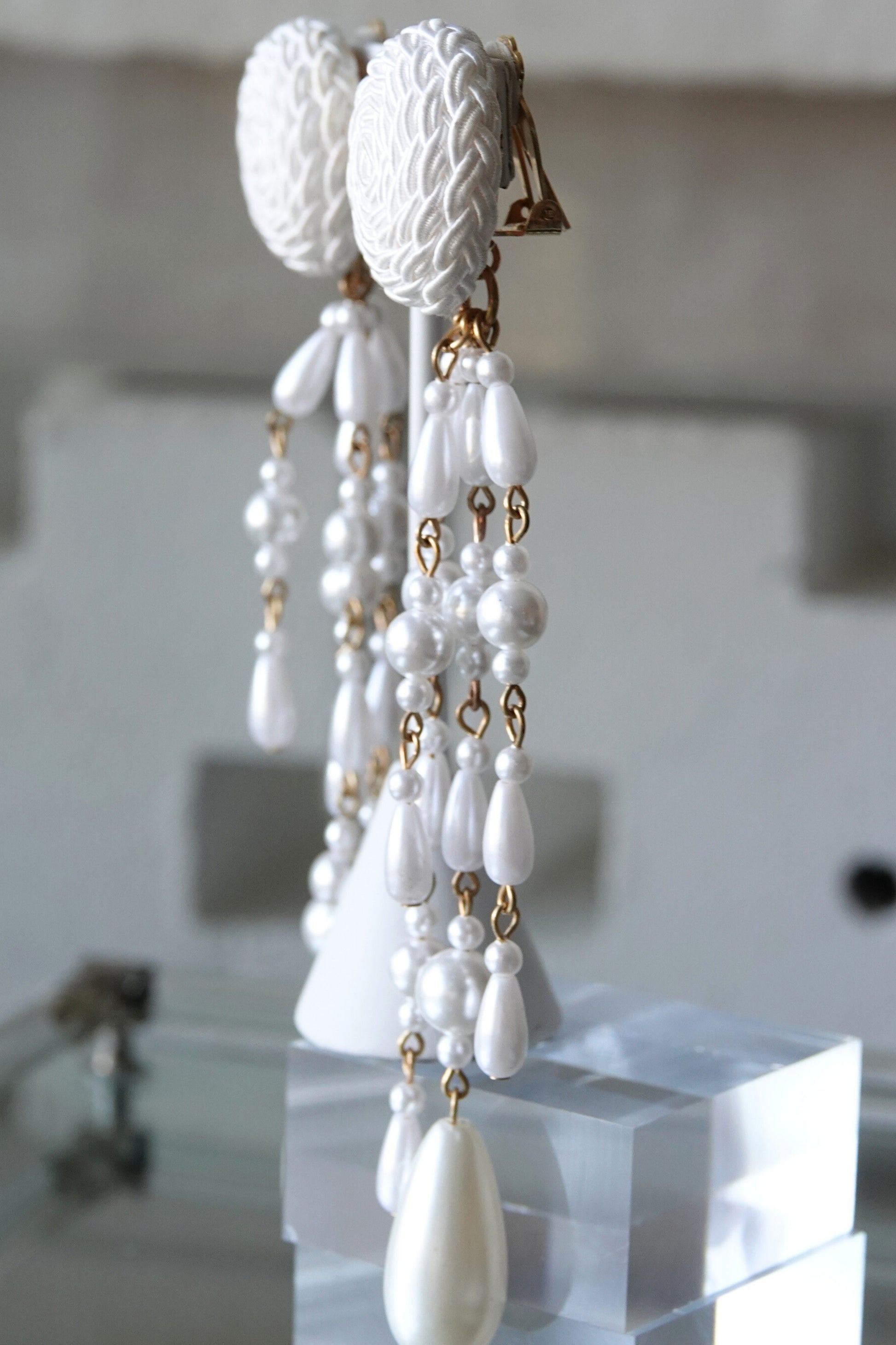 Vintage faux pearl and satin cord clip earrings, styled detail — Disco Palma