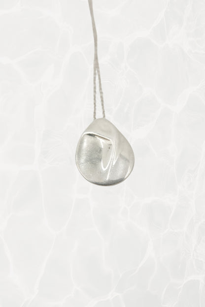 Elsa Peretti for Tiffany & Co. sterling silver Madonna pendant necklace: detailed close-up of chain links and lobster clasp showing quality sterling silver construction