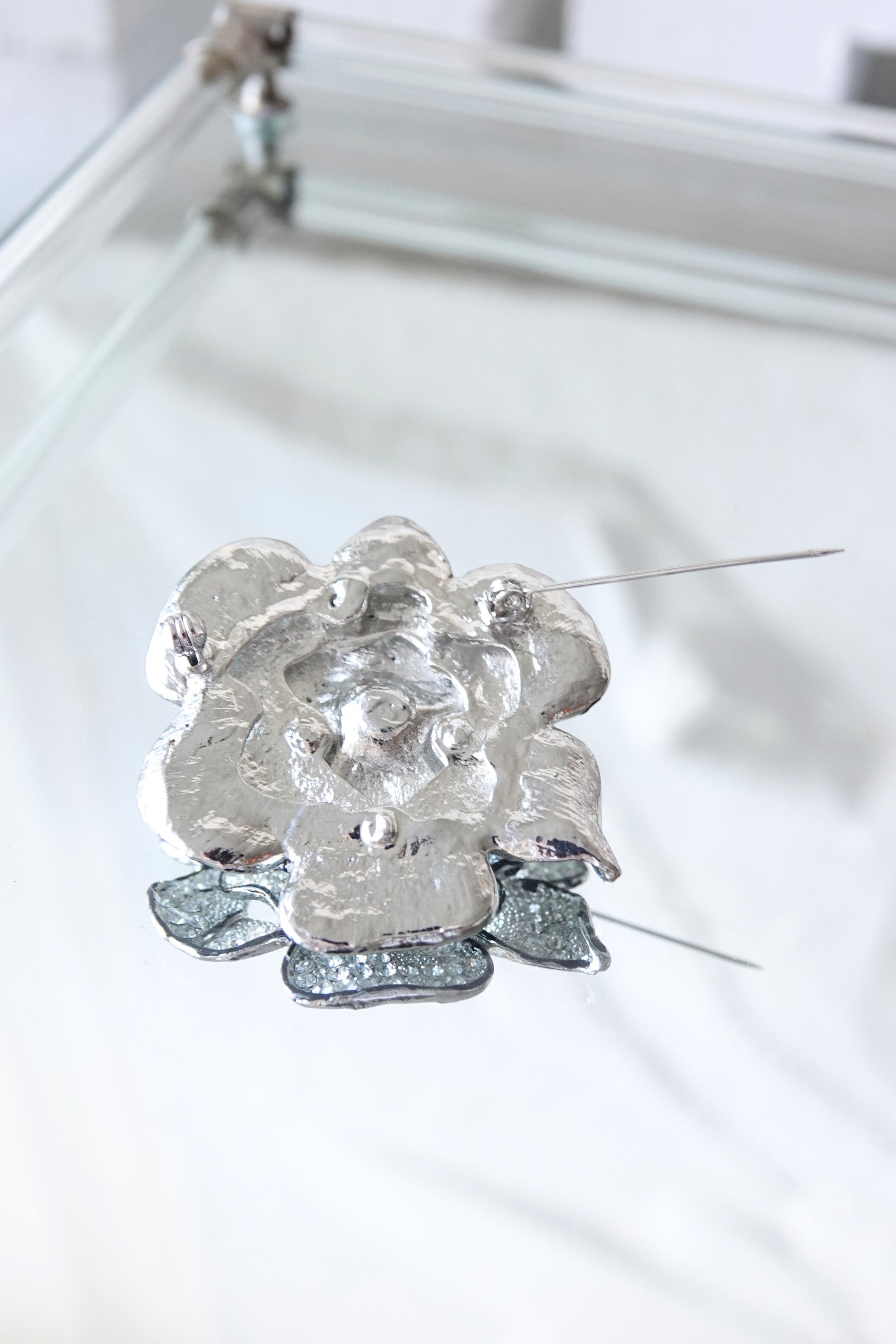 Camellia brooch back — close-up of pin and construction