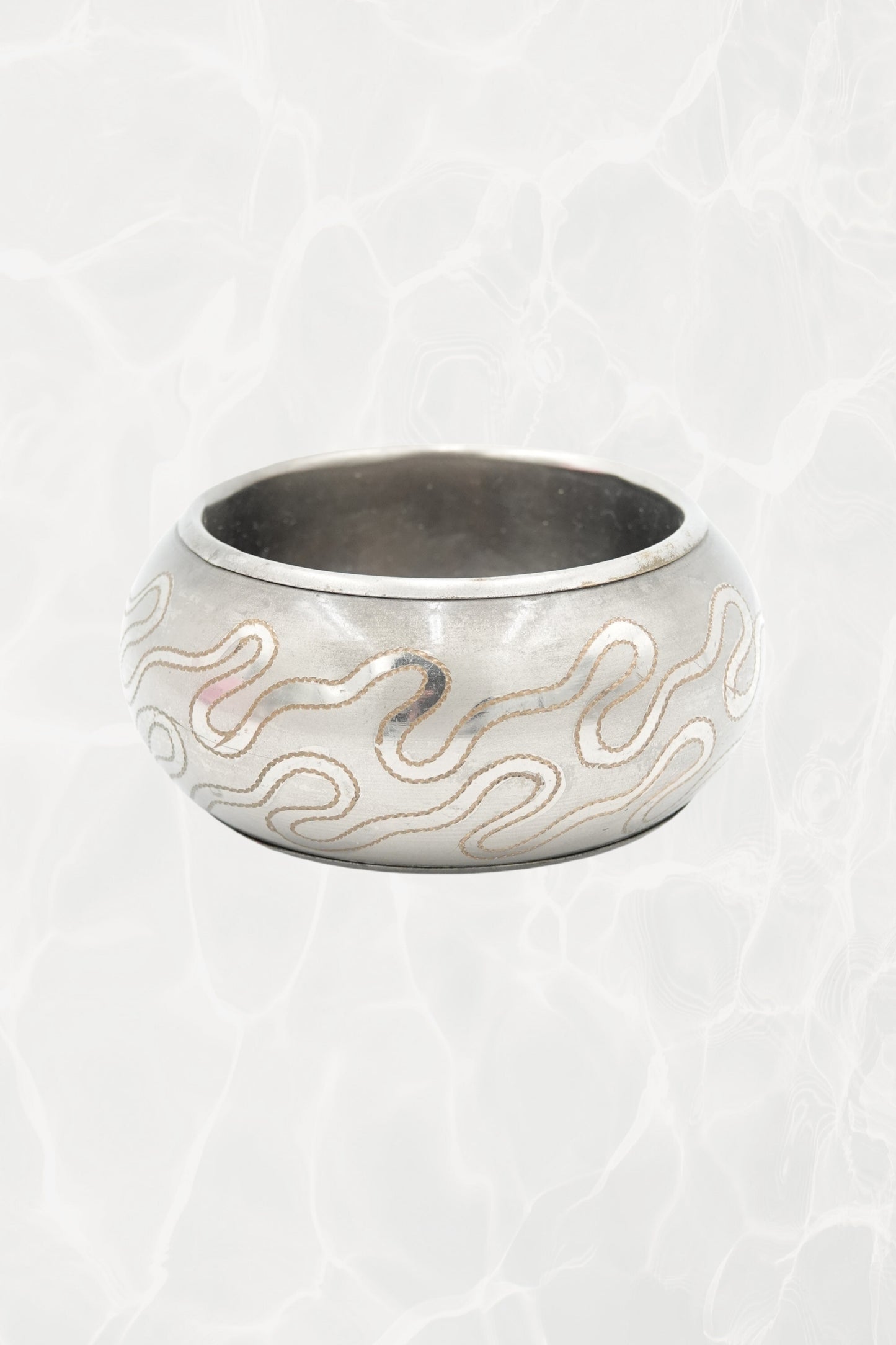 Etched serpentine bangle from India — hero front view