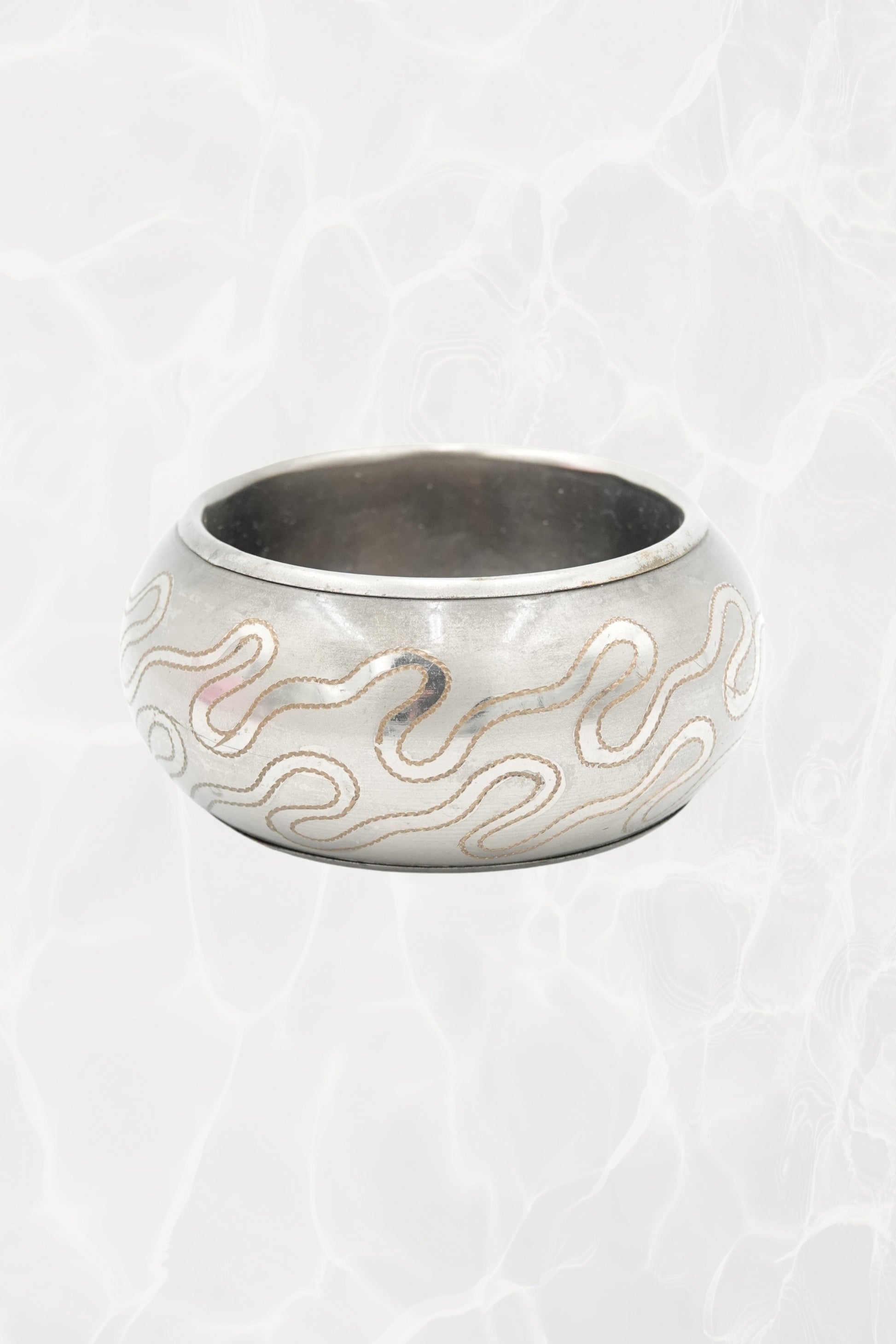 Etched serpentine bangle from India — hero front view