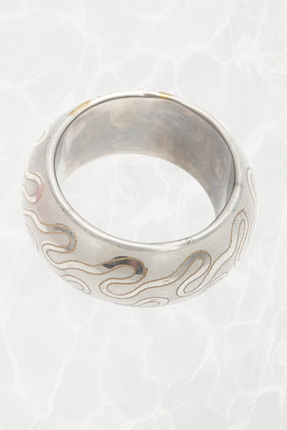 Indian folk art bangle — top-down angle showing full pattern