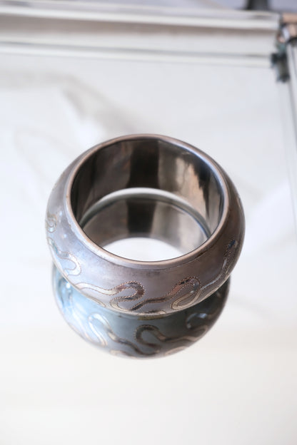 Indian etched bangle — styled top-down view