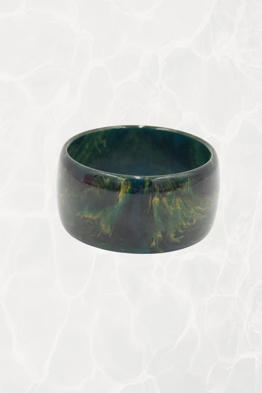 Deep green marbled wide bangle — front view