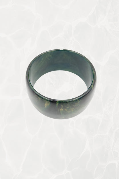 Wide green marbled resin bangle — side angle