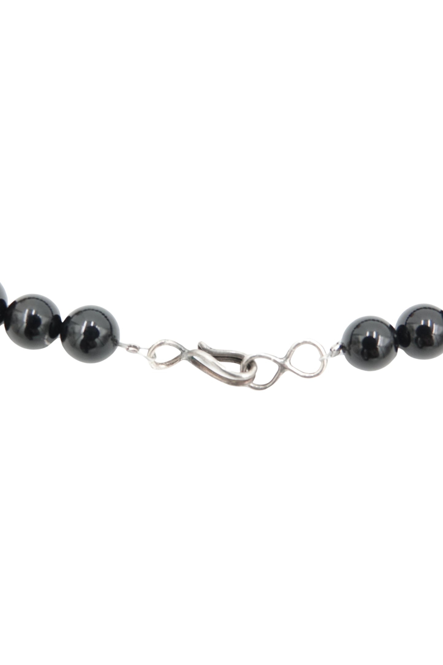 Vintage 1980s black onyx beaded necklace — close-up of graduated bead sizing
