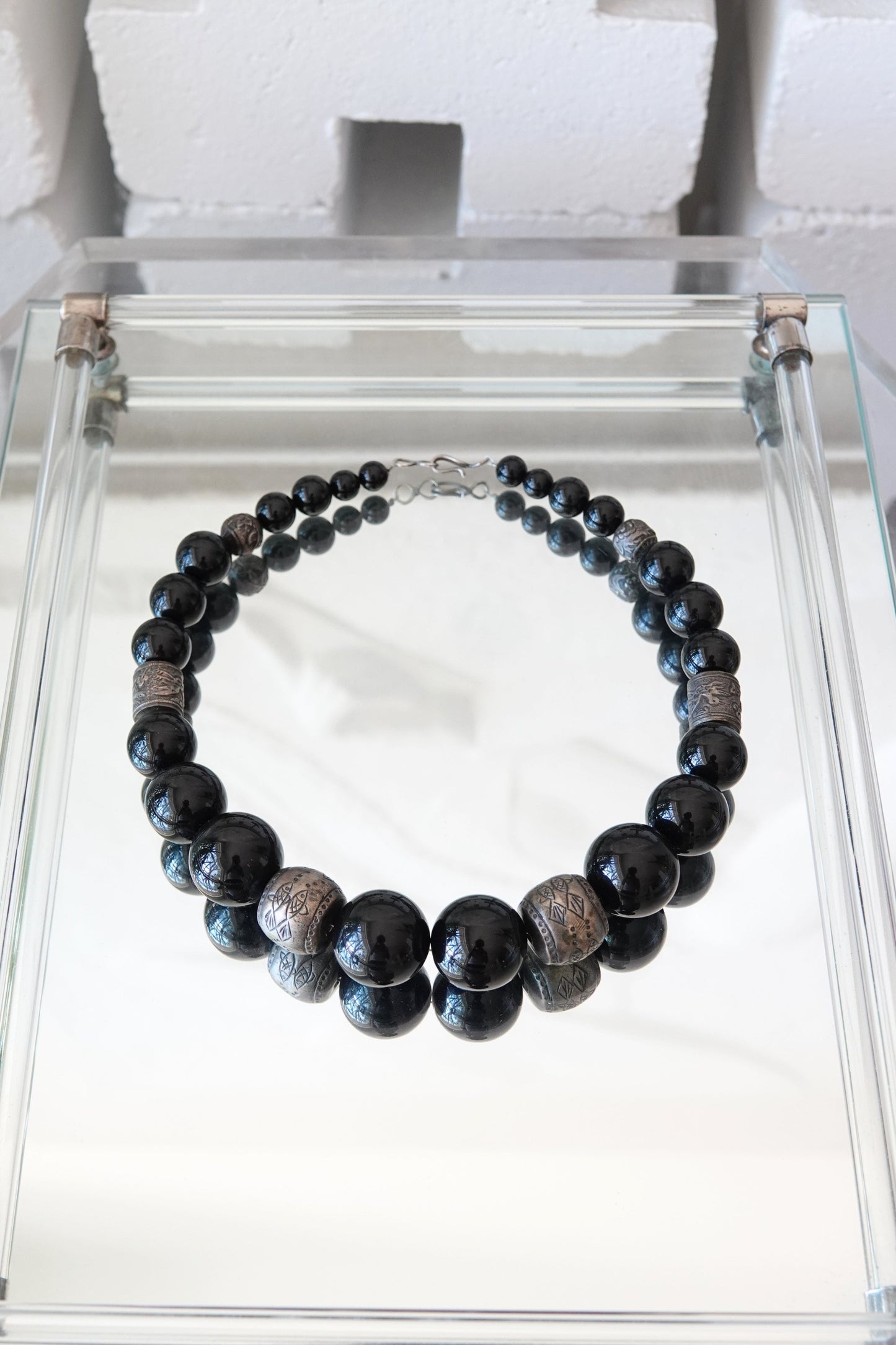 Vintage 1980s black onyx beaded necklace — full necklace laid flat