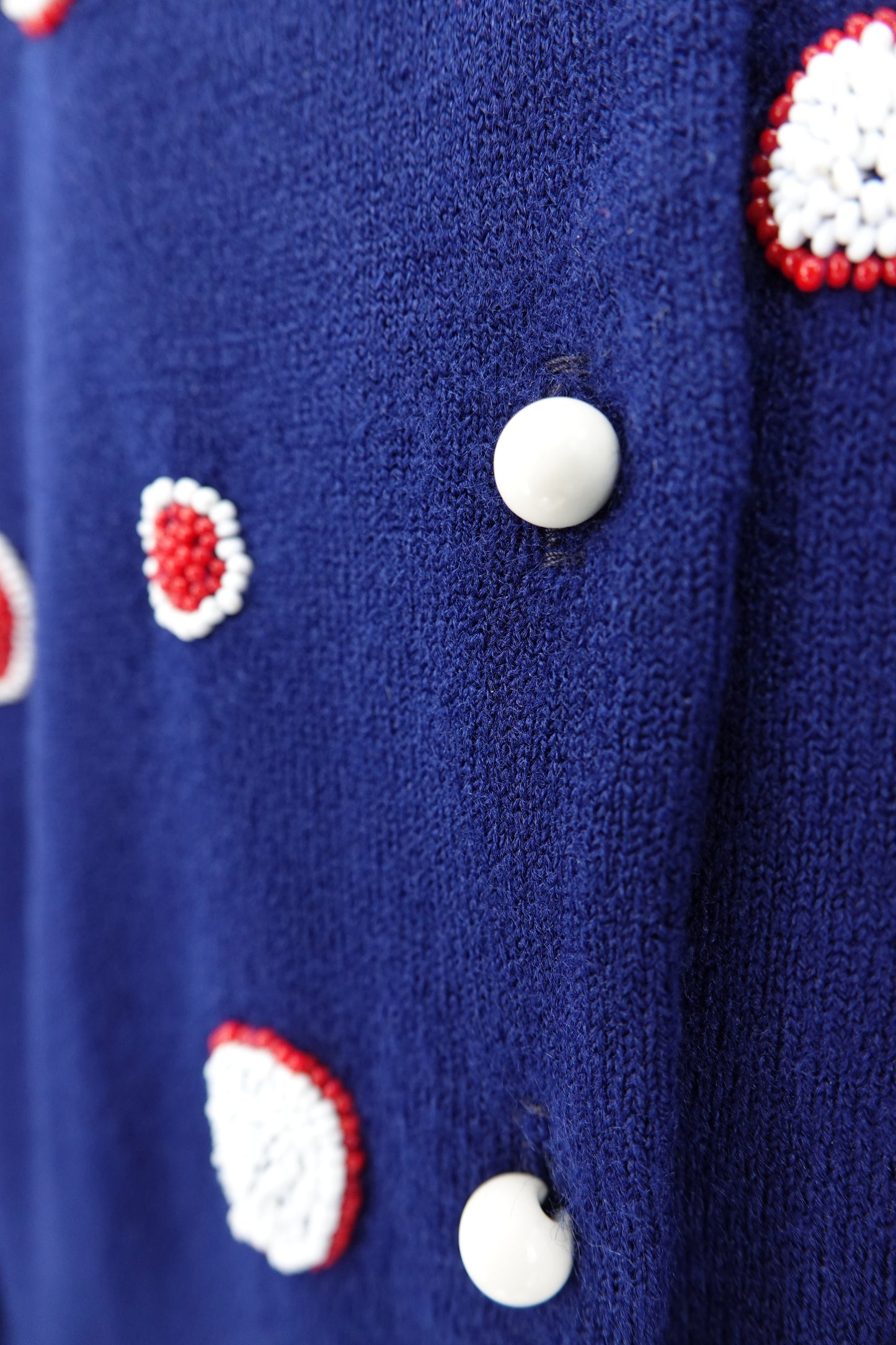 Schiaparelli vintage navy cardigan, button placket and bead detail close-up — Disco Palma