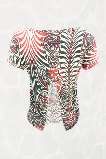 Jean Paul Gaultier JPG Jeans SS96 Cyberbaba crop top back view: open-back design showing J.P. Gaultier Jeans label, tribal tattoo print in red, black and white jersey