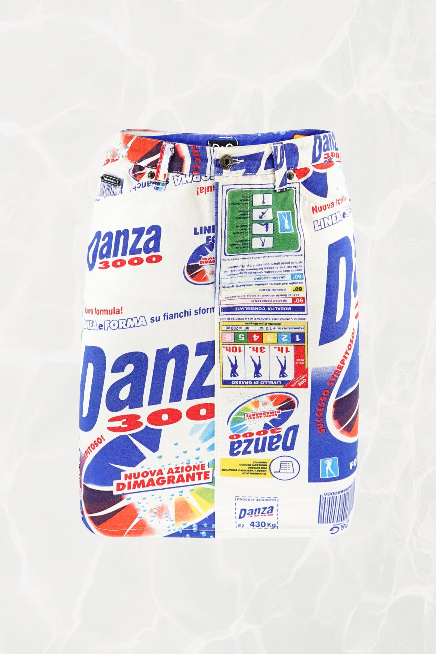 D&G SS02 Danza 3000 denim mini skirt front view: fitted denim skirt covered in bold Danza 3000 Italian advertising print, blue and red graphic logo on white denim
