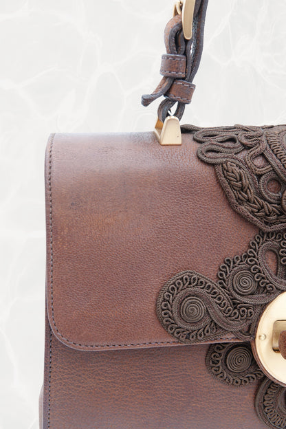 Vintage Prada Antic Passamane bag - three-quarter view showing passamane embroidery