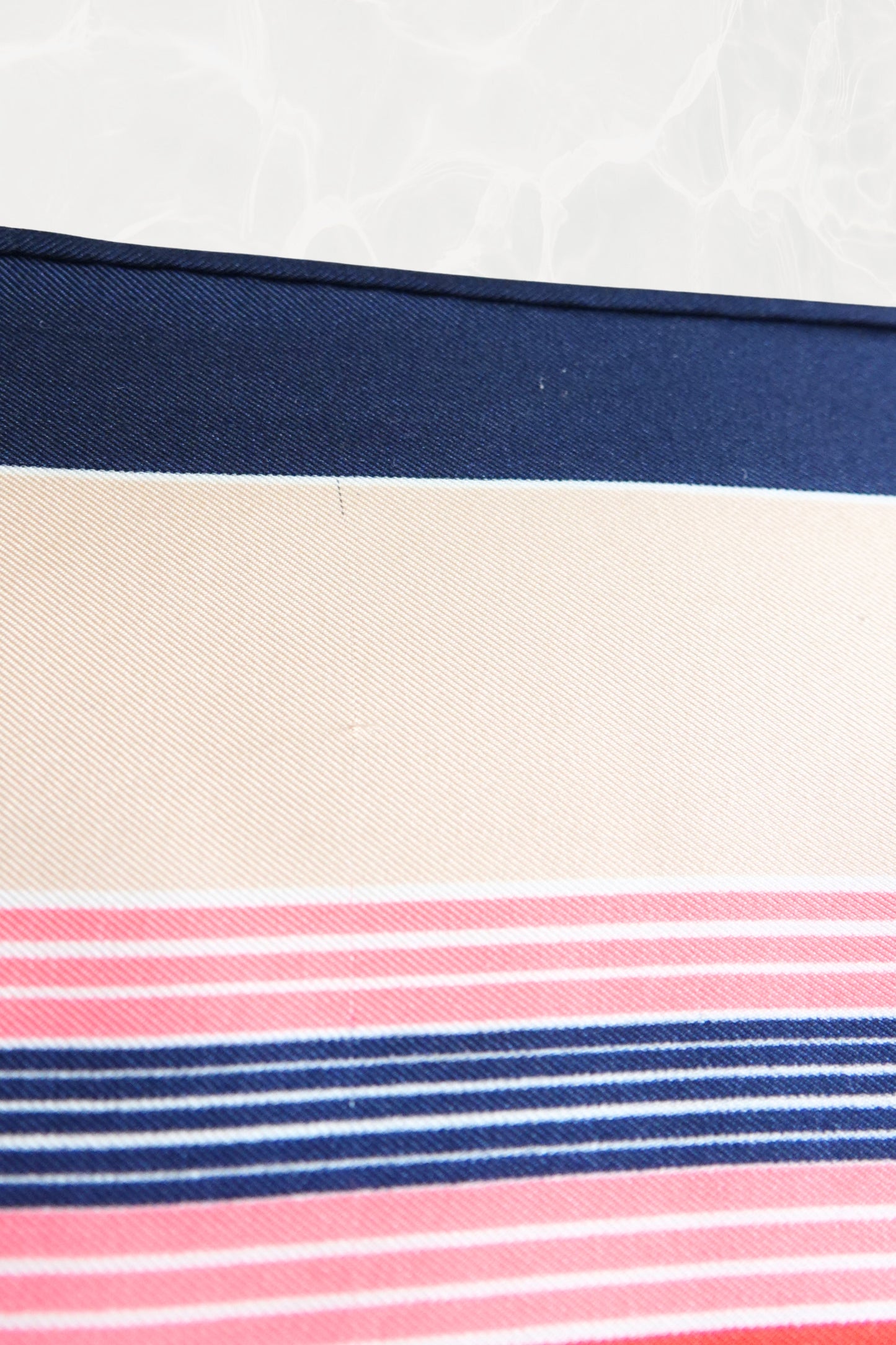 Late 1970s early 1980s YSL Yves Saint Laurent silk scarf: folded view showing the scarf styled to display the geometric stripe pattern arrangement