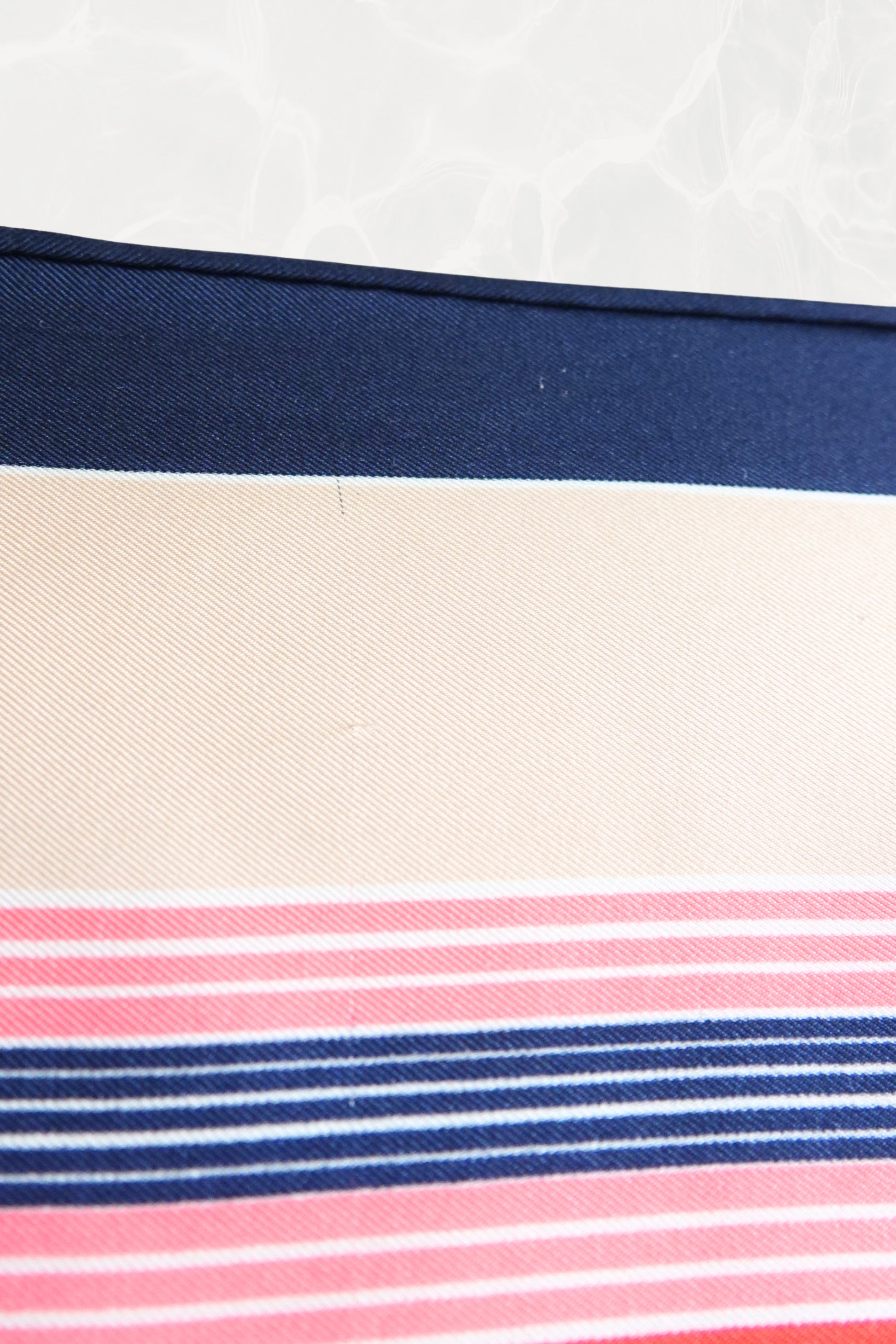 Late 1970s early 1980s YSL Yves Saint Laurent silk scarf: folded view showing the scarf styled to display the geometric stripe pattern arrangement