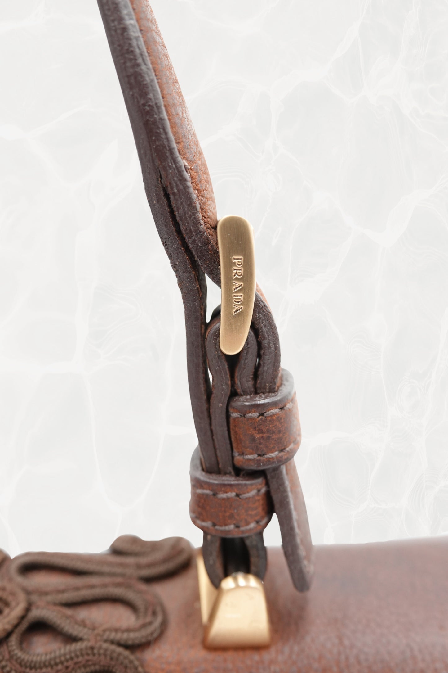Prada Antic Passamane brown bag showing cord embroidery detail
