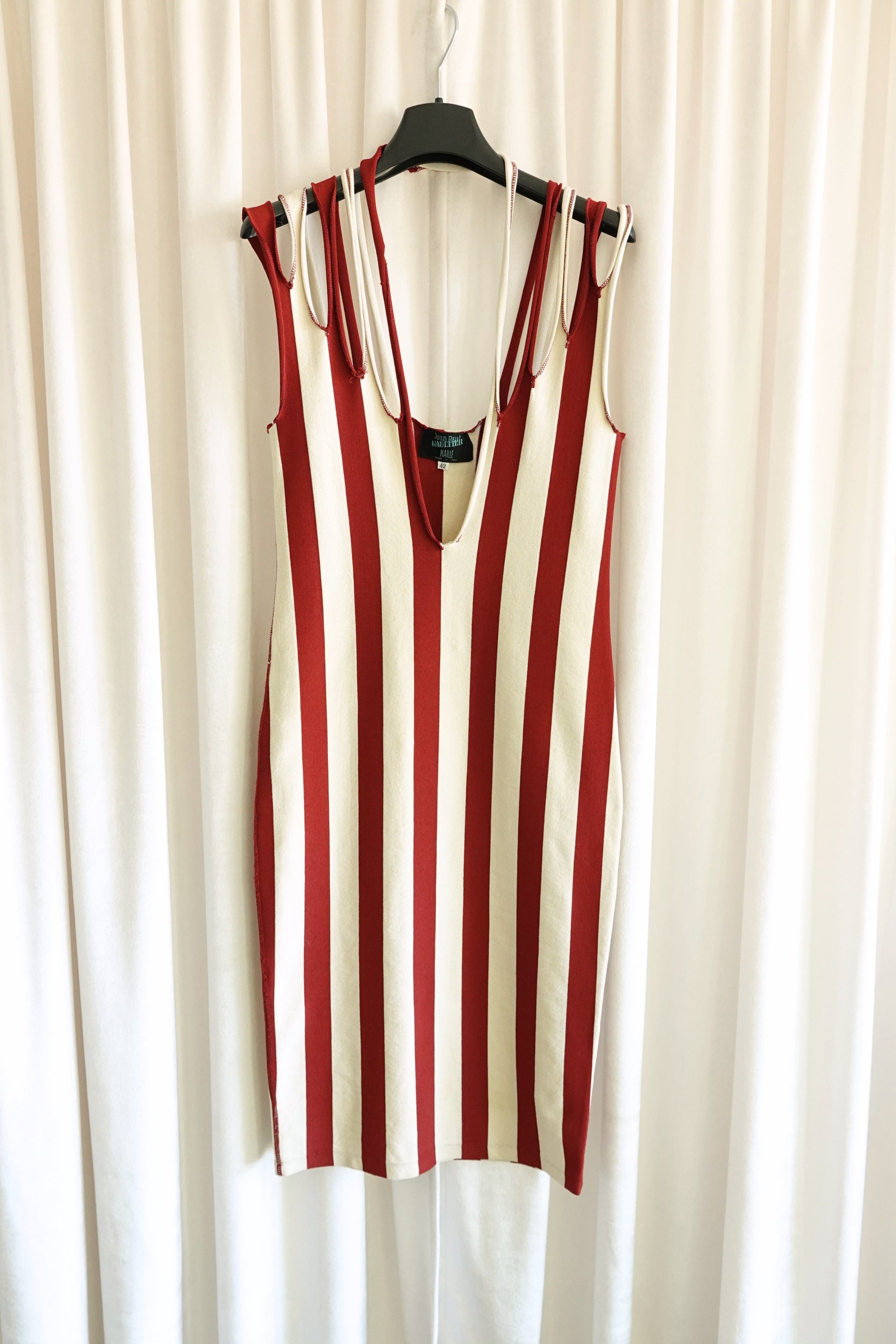 Jean Paul Gaultier Maille 1990s red and cream stripe bodycon midi dress, front on hanger — Disco Palma