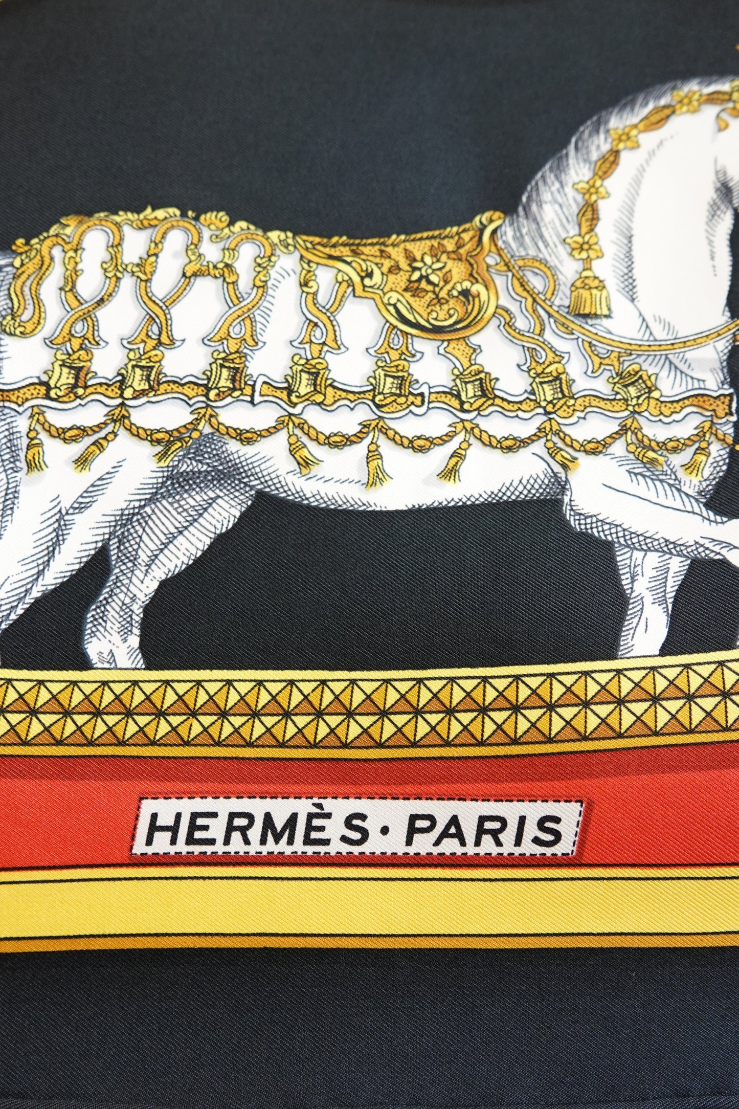 Hermès Grand Apparat Carré 90 detail: white ceremonial horse in gold tack, HERMÈS PARIS label, vintage silk scarf