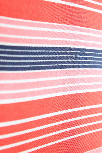 Late 1970s early 1980s YSL Yves Saint Laurent silk scarf: detail of YSL label showing Yves Saint Laurent Made in France woven tag on reverse side