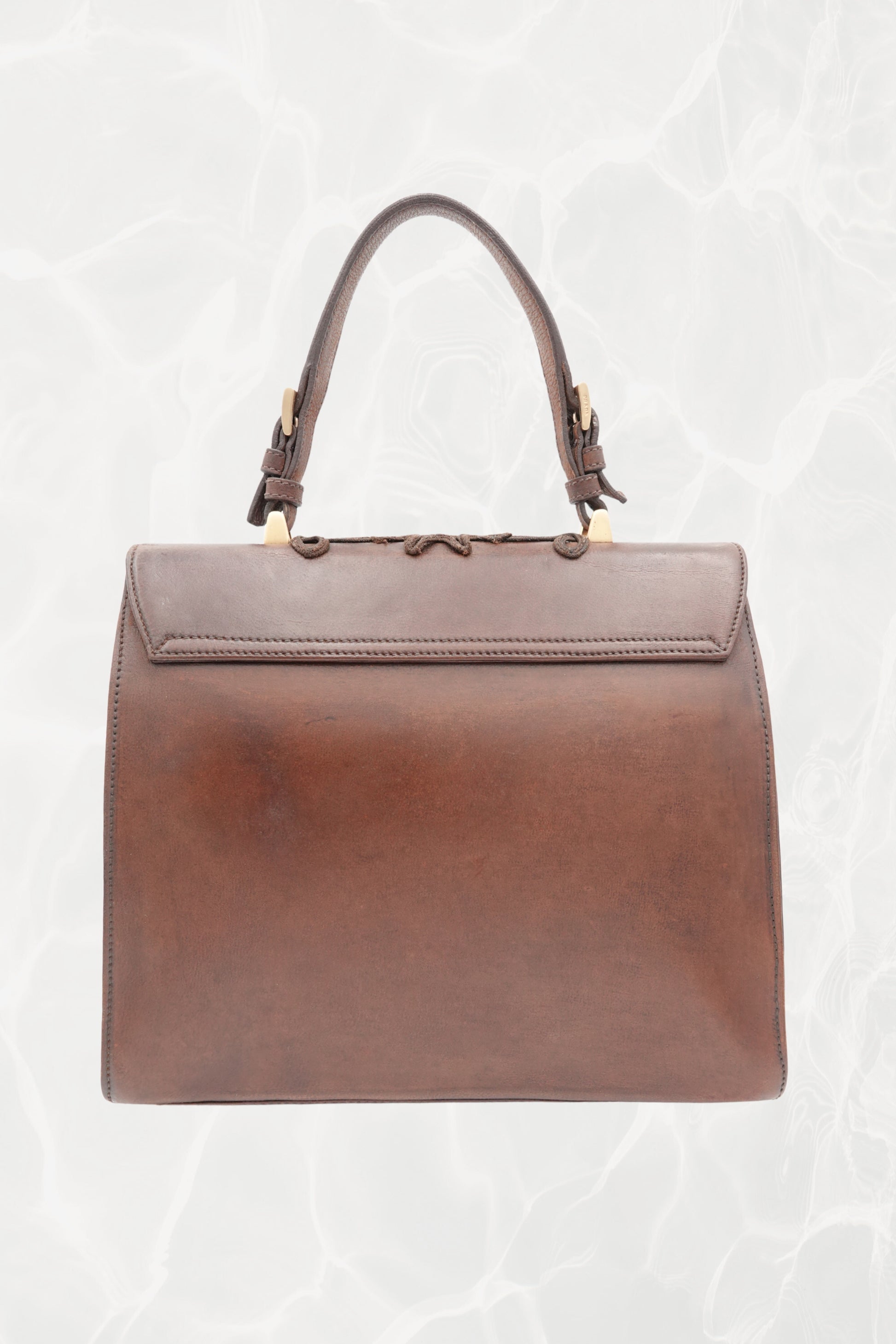 Top handle detail on vintage 1990s Prada goat leather bag