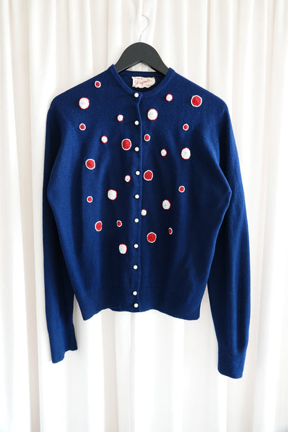 Schiaparelli vintage navy cardigan, front view on hanger — Disco Palma