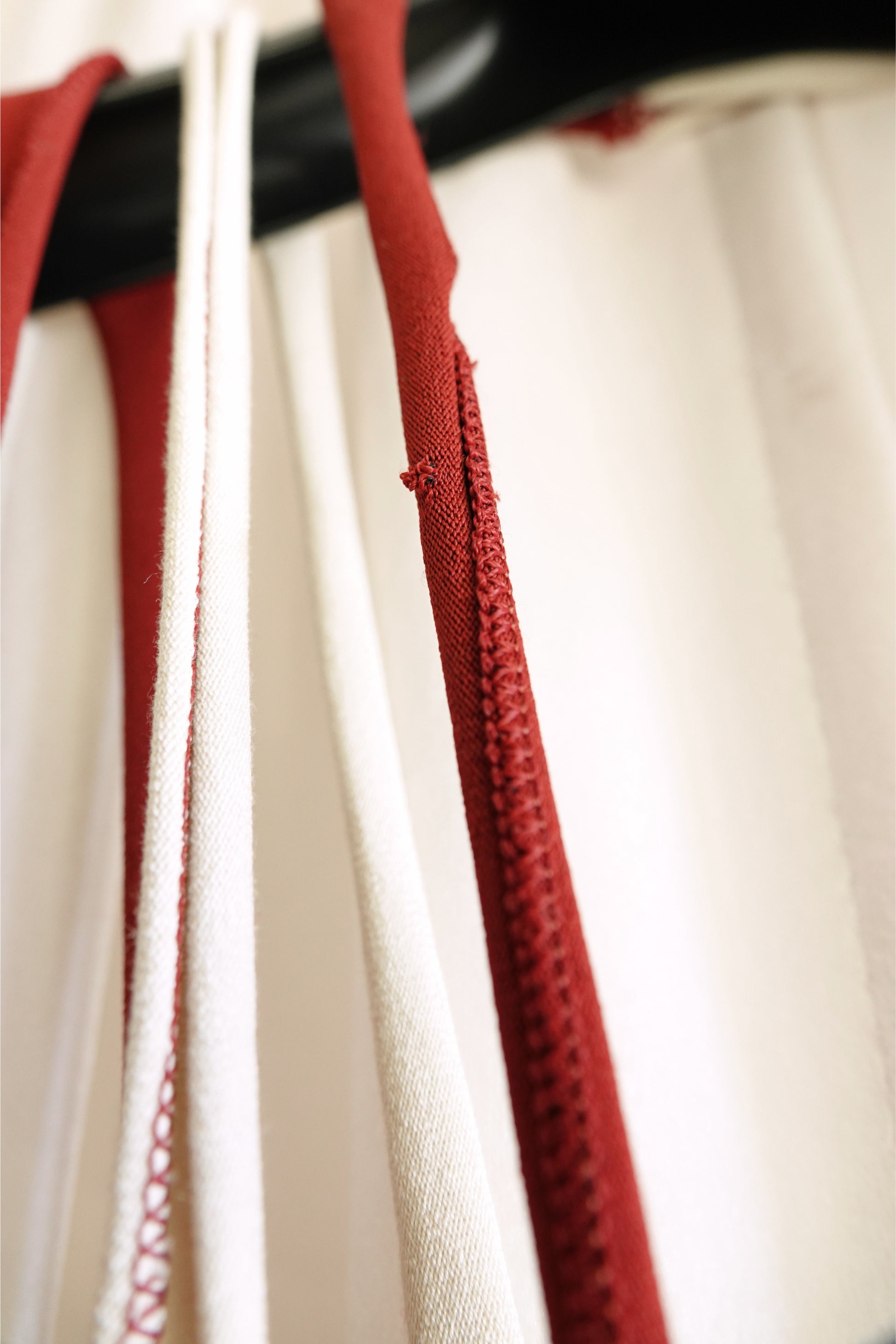 Jean Paul Gaultier Maille 1990s red and cream stripe dress, strap detail close-up — Disco Palma