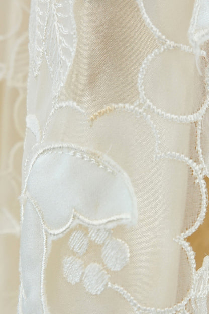 Condition detail — George F. Couture ivory ball gown