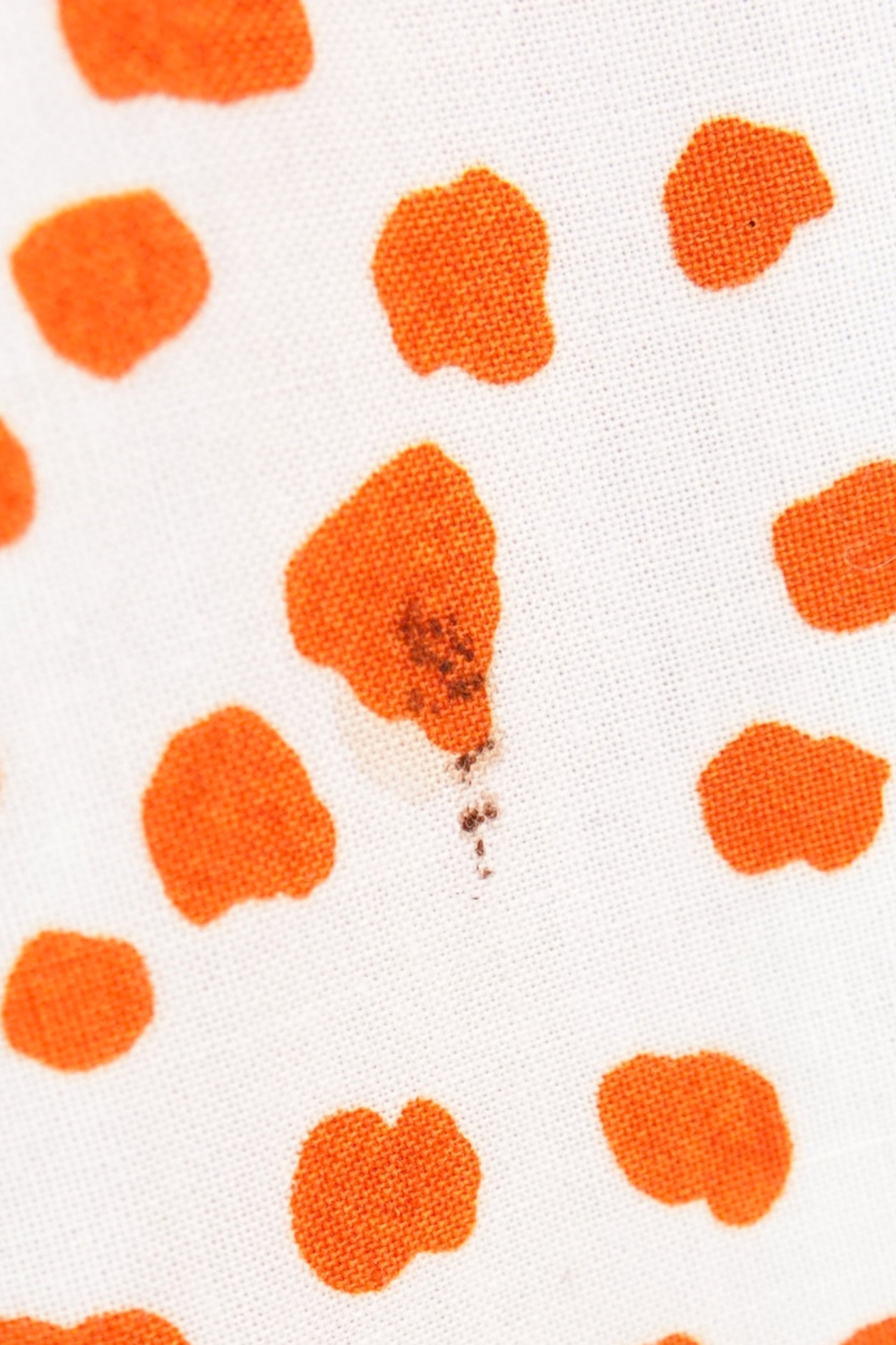 Marimekko 1978 maxi dress, condition detail — small hole with staining on lower skirt — Disco Palma