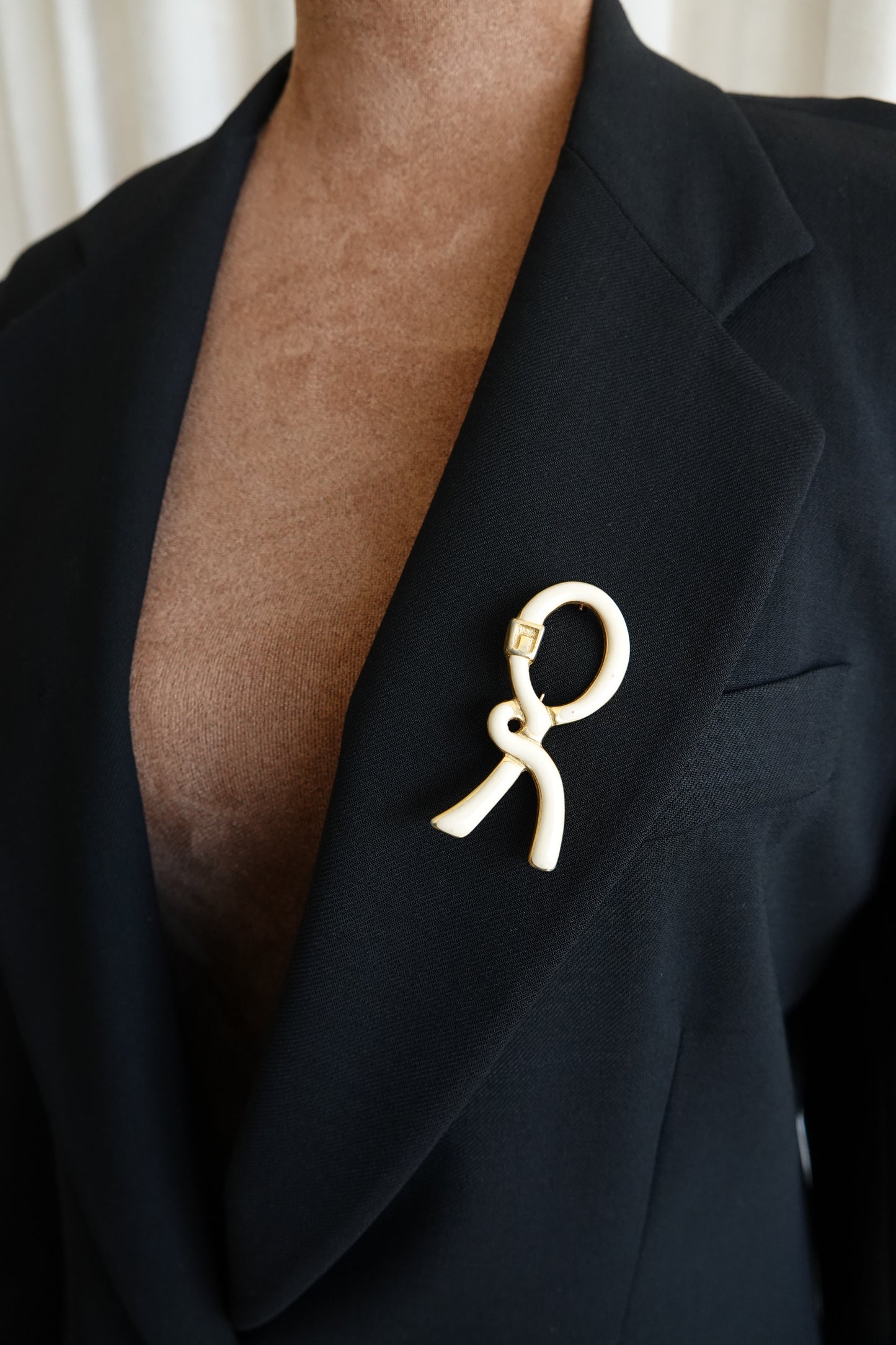 1980's Cream & Gold Enamel Ribbon “R” Logo Brooch
