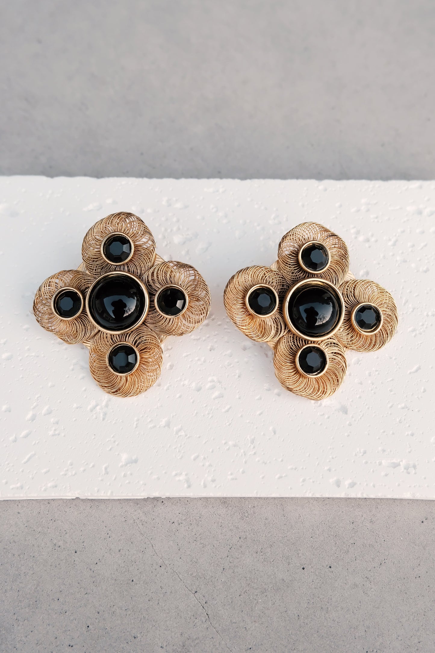 Vintage Gold-Tone Filigree Clip-On Earrings with Black Cabochons