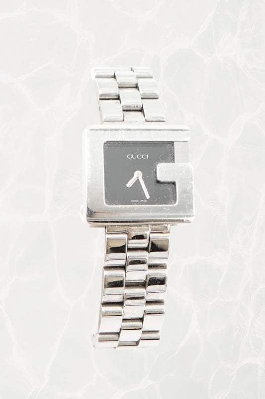 Tom Ford for Gucci G-Frame watch, three-quarter angle showing rectangular case and multi-row bracelet
